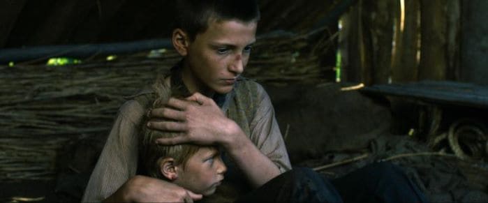 Hans (Levin Liam) calms a young boy